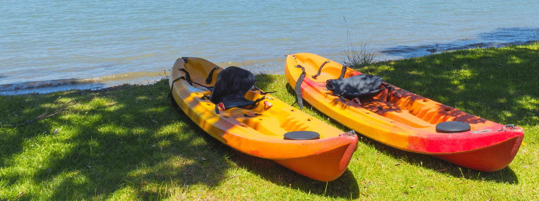 Kayaks next to a river in New Zealand